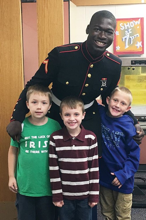 Mickenson also met with his former Mentorship Program friends, (left to right) now-second-graders Cole Wilson, Caden Champion, and Landyn Christensen. (Photo by Kristy Carey)