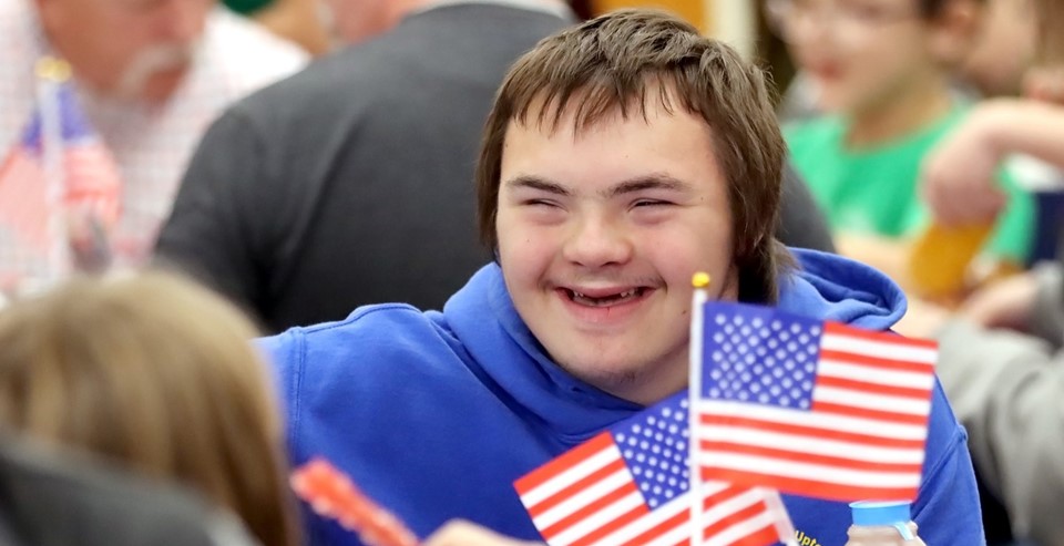 Veterans Day Breakfast student smiles (11/2023)