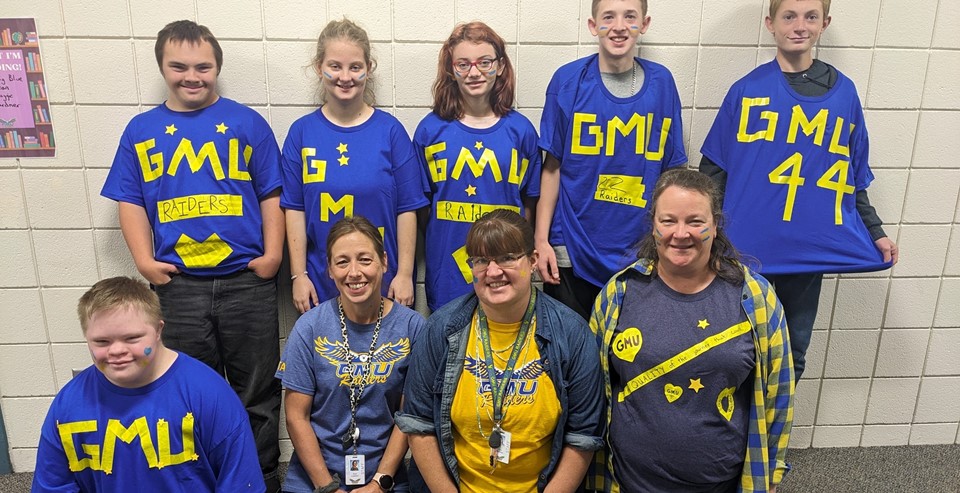 Raiders in GMU shirts (9/2023)