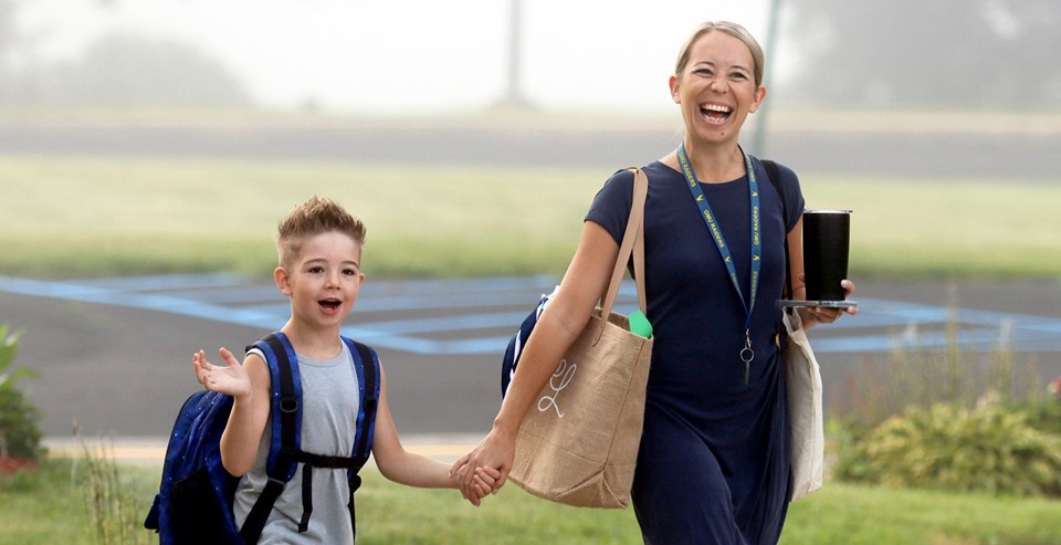 Student and teacher smiling (9/2023)