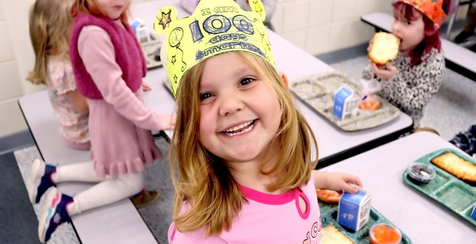 Student smiles on 100th day of school (2/2024)